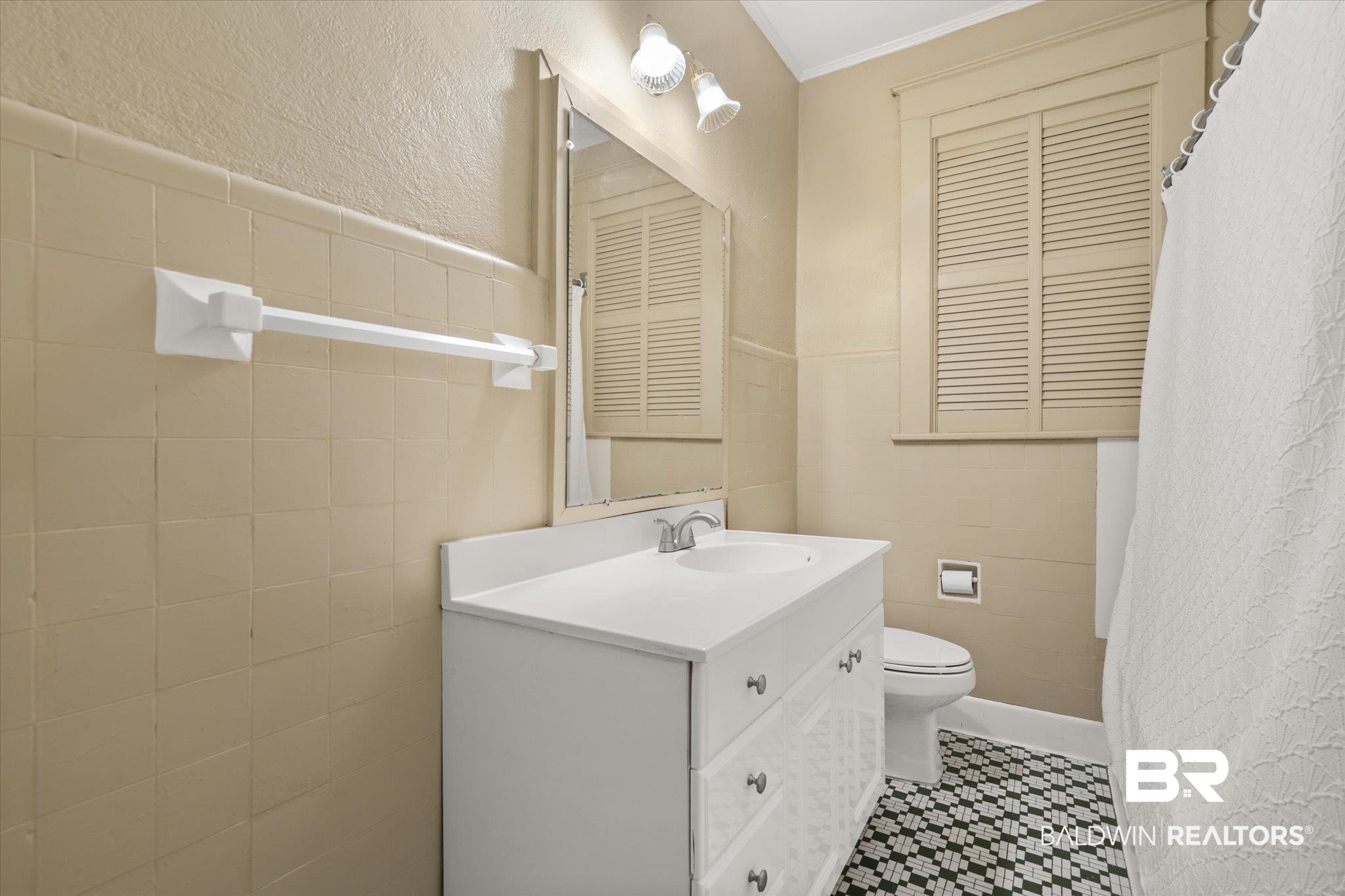 24 Macy Place Mobile, AL 36604 - Photo 20 of 38 Bathroom featuring toilet, vanity, ornamental molding, tile walls, and tile patterned floors