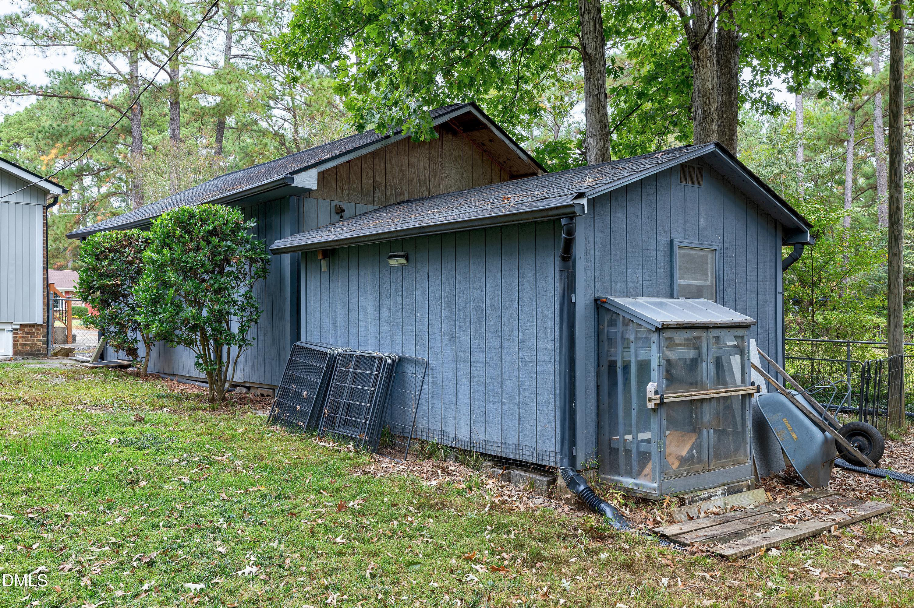 5817 Newhall Road Durham, NC 27713 - Photo 42 of 51 With small greenhouse to give your garden a head start