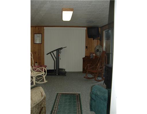 258 Coffee Run Road Pulaski, PA 16143 - Photo 11 of 18 Exterior Front. Sunroom with slider to patio, franklin pro-pane stove for heat.