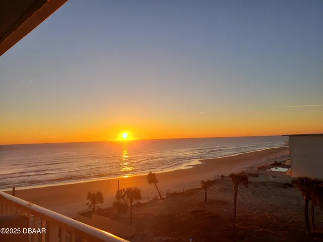 a view of an ocean from a balcony