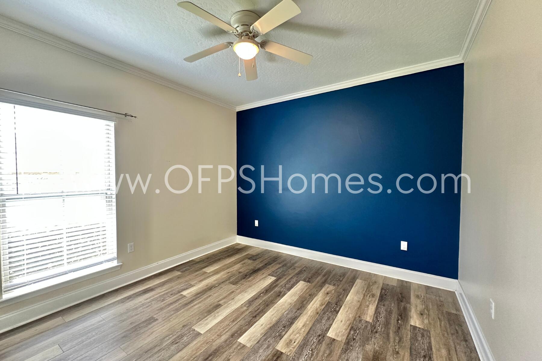 4542 Annabelle Lane Crestview, FL 32539 - Photo 8 of 35 a view of an empty room with a window