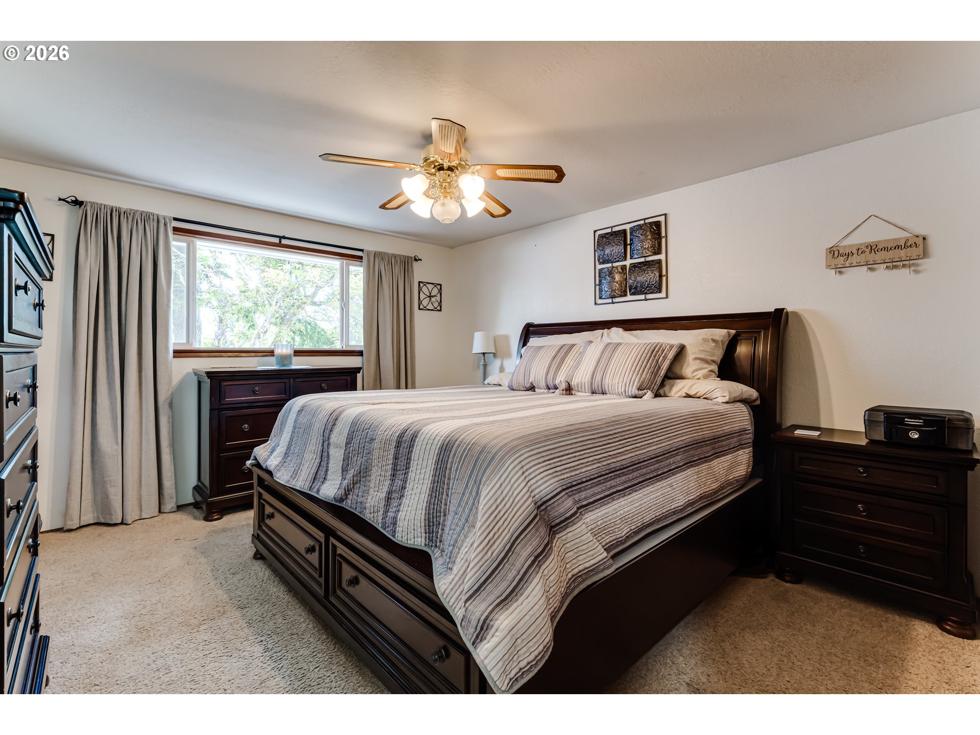 1088 Linda Lane Springfield, OR 97478 - Photo 17 of 43 a bedroom with a bed and a chandelier