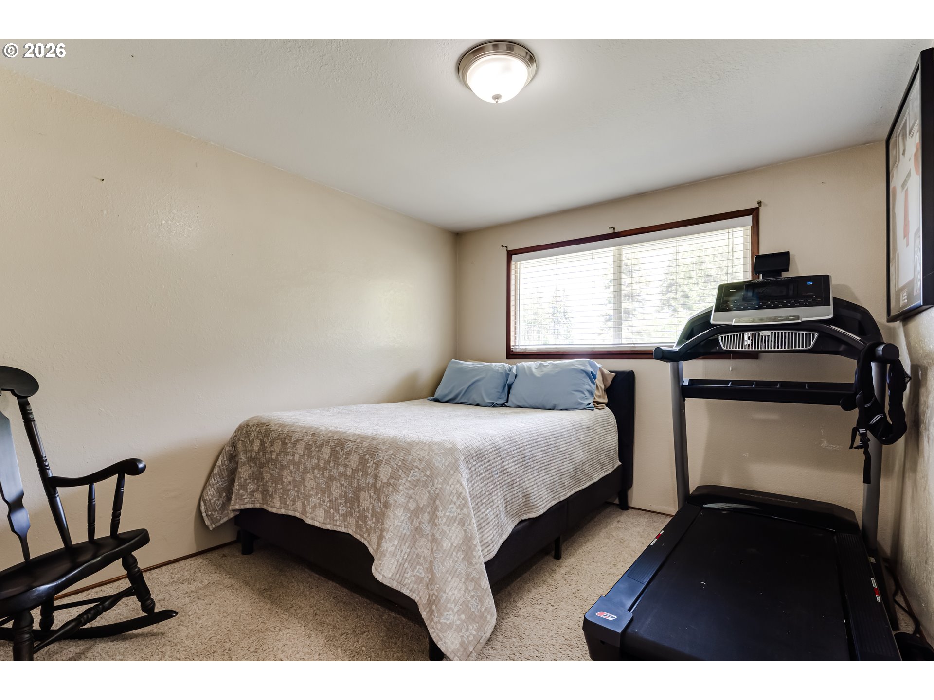 1088 Linda Lane Springfield, OR 97478 - Photo 23 of 43 a bedroom with a bed and a chair