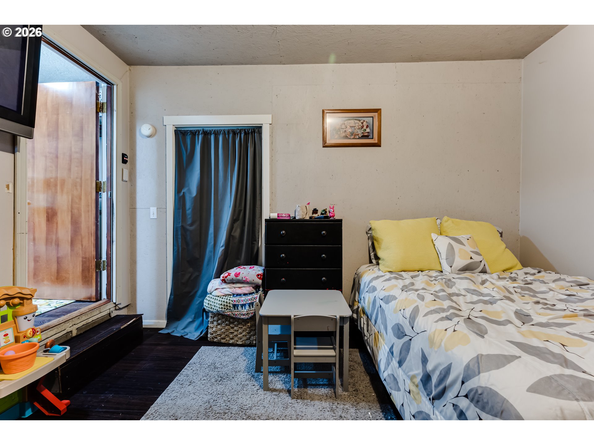 1088 Linda Lane Springfield, OR 97478 - Photo 24 of 43 a bedroom with a bed dresser and a window