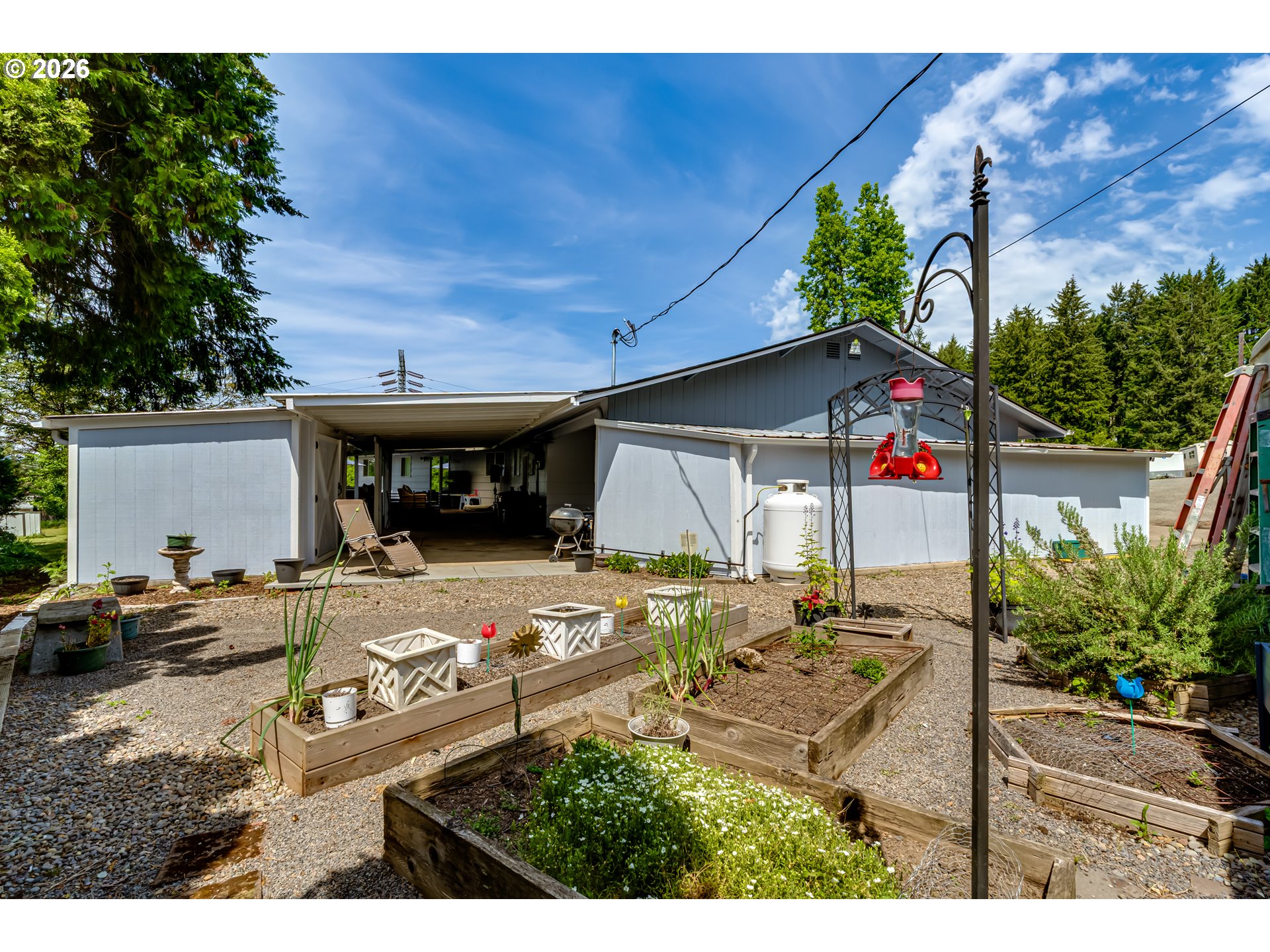 1088 Linda Lane Springfield, OR 97478 - Photo 35 of 43 a view of a house with backyard and sitting area