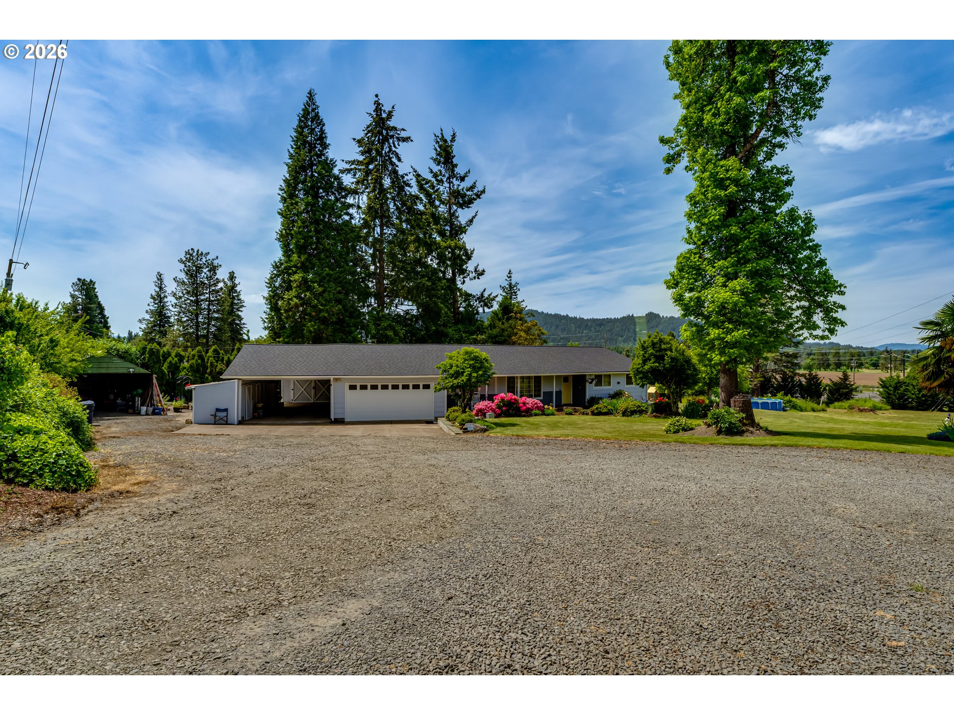 1088 Linda Lane Springfield, OR 97478 - Photo 38 of 43 a view of a field with plants and trees