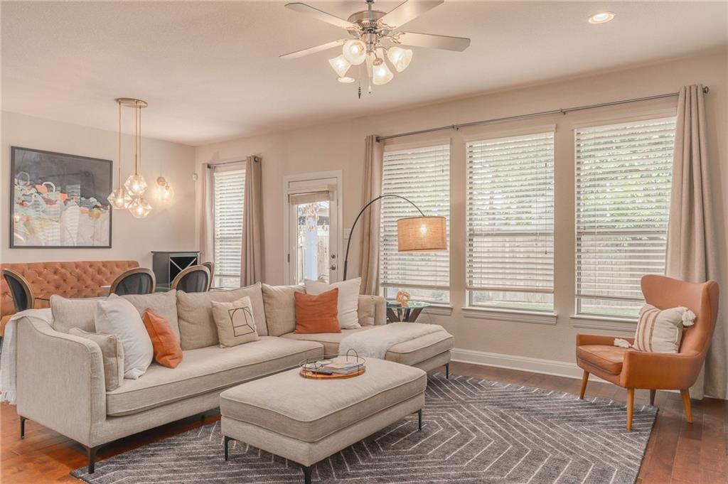 6708 Menchaca Road, Unit 14 Austin, TX 78745 - Photo 18 of 22 Open-concept living area featuring hardwood flooring