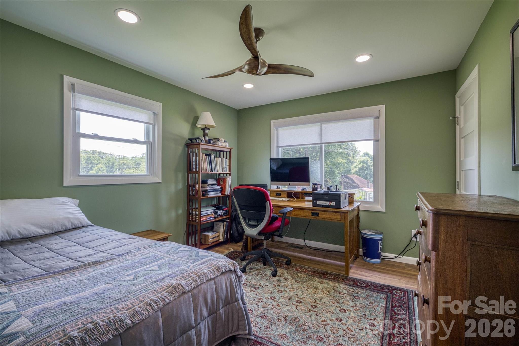 214 Howard Street Morganton, NC 28655 - Photo 17 of 22 a bedroom with a bed and a window