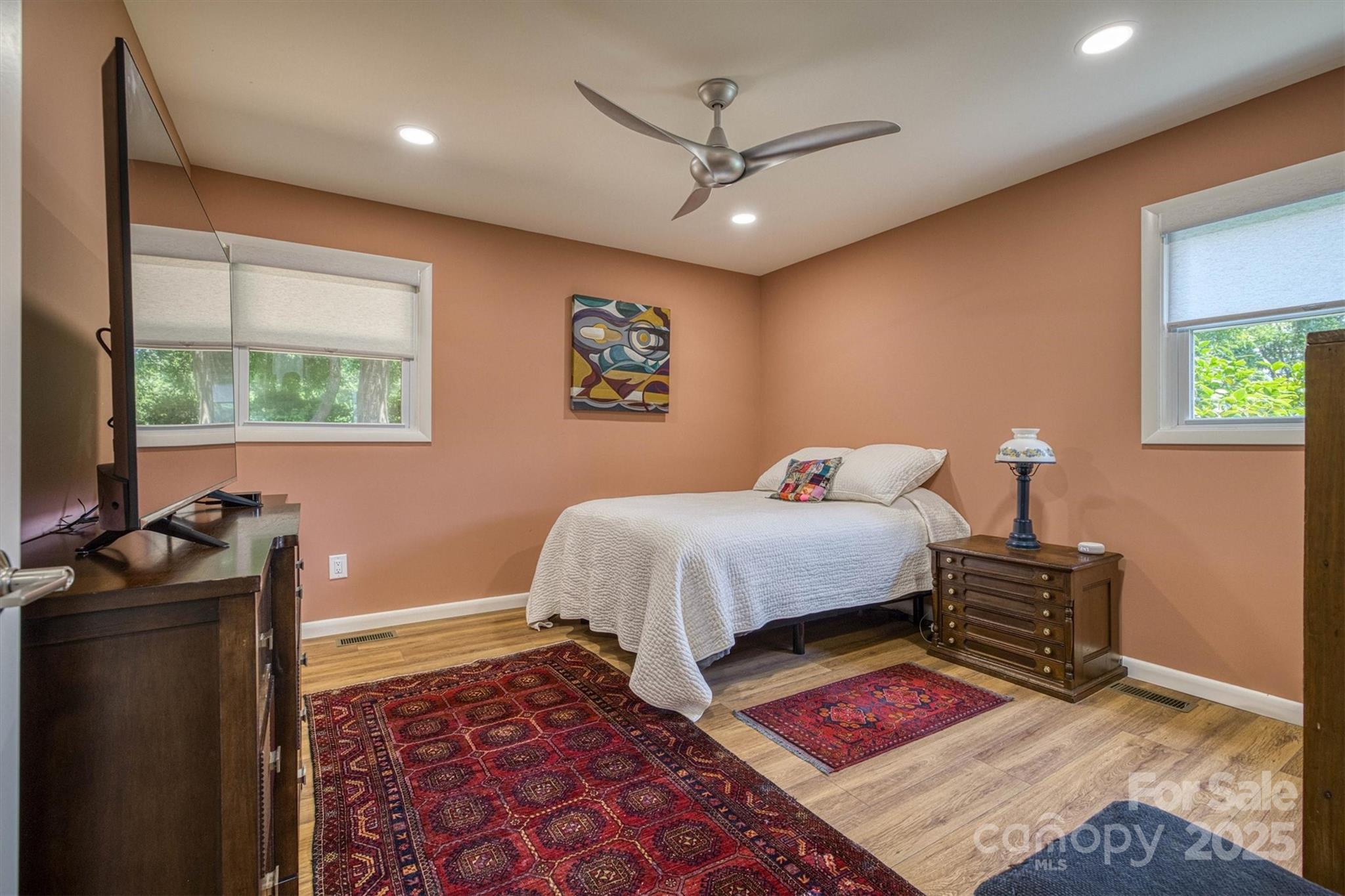 214 Howard Street Morganton, NC 28655 - Photo 17 of 29 a bedroom with a bed and a window