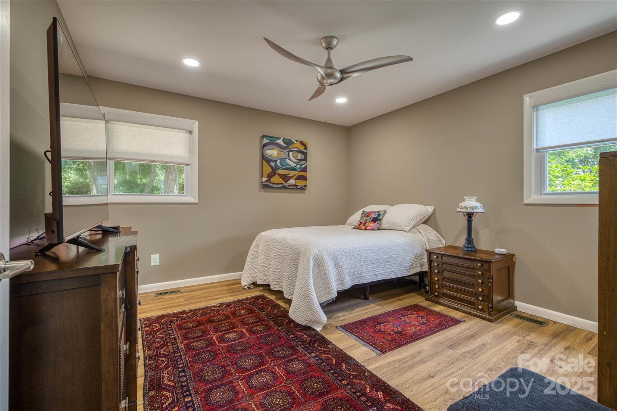214 Howard Street Morganton, NC 28655 - Photo 18 of 29 a bedroom with a bed and a window