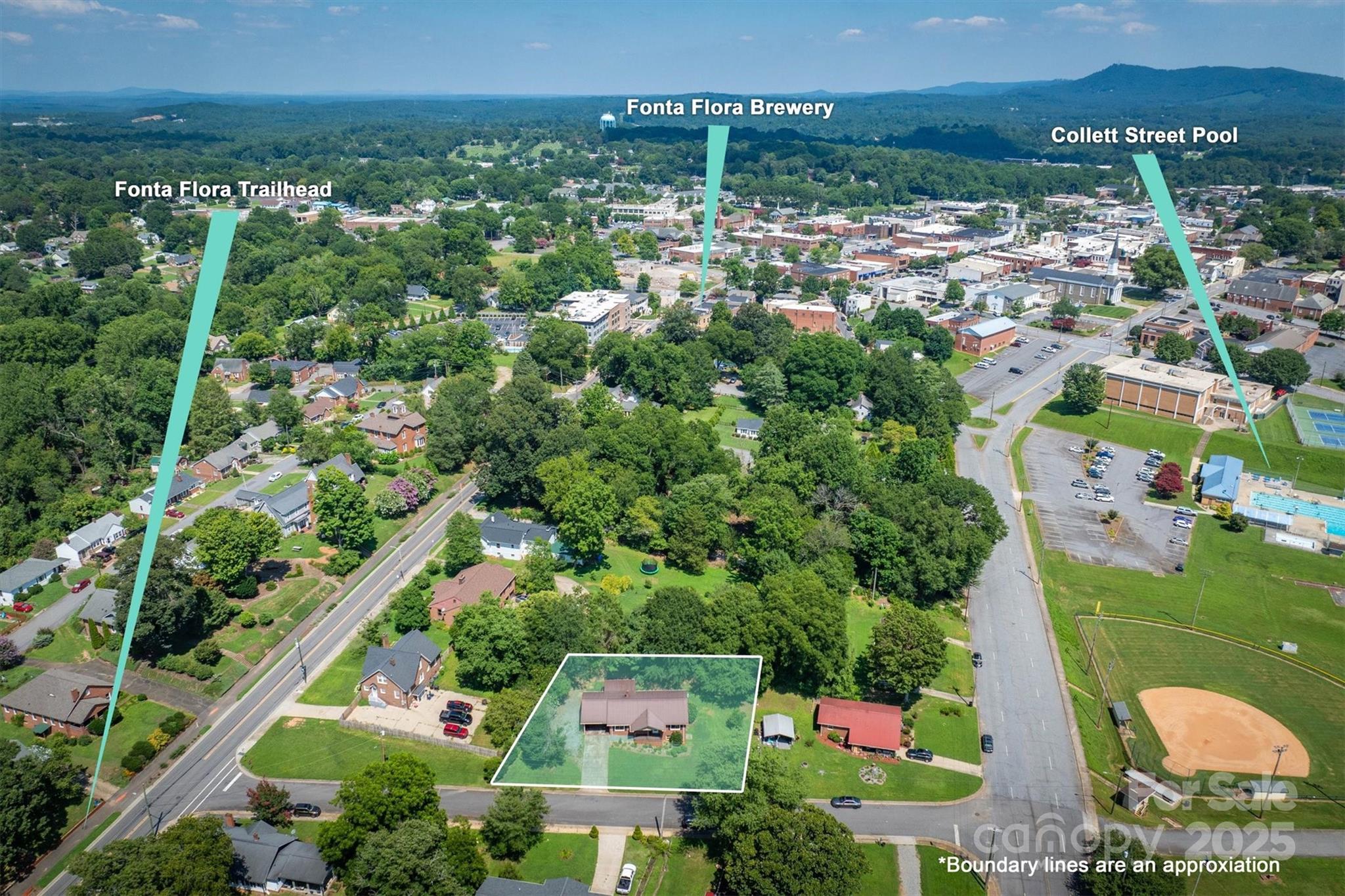 214 Howard Street Morganton, NC 28655 - Photo 2 of 29 an aerial view of a city