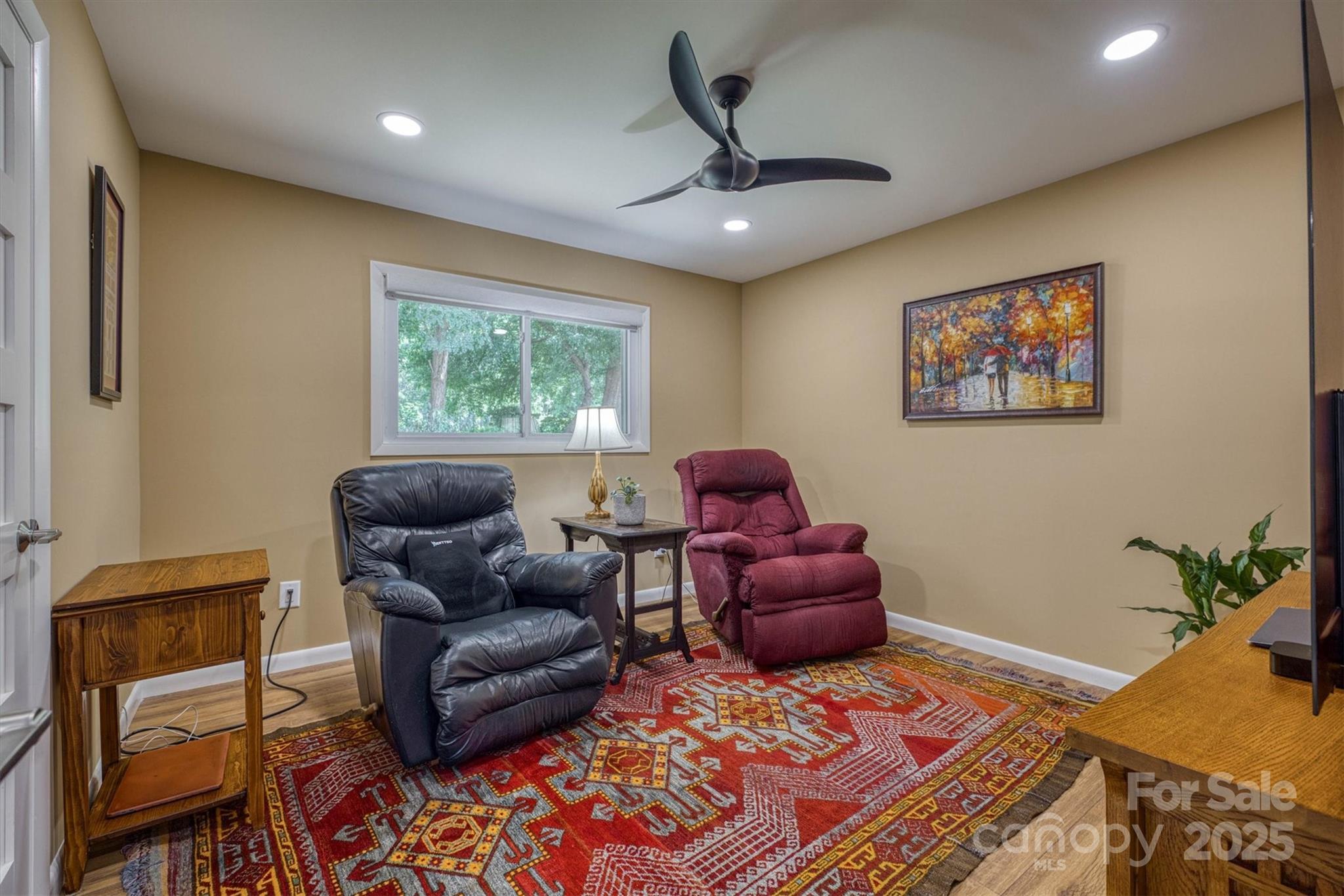 214 Howard Street Morganton, NC 28655 - Photo 23 of 29 a living room with furniture and a window