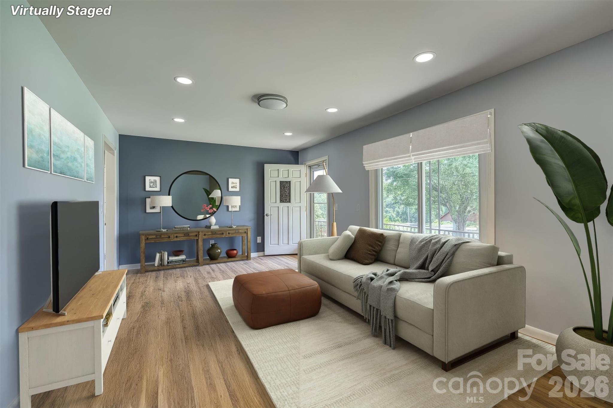 214 Howard Street Morganton, NC 28655 - Photo 4 of 22 a living room with furniture and a large window