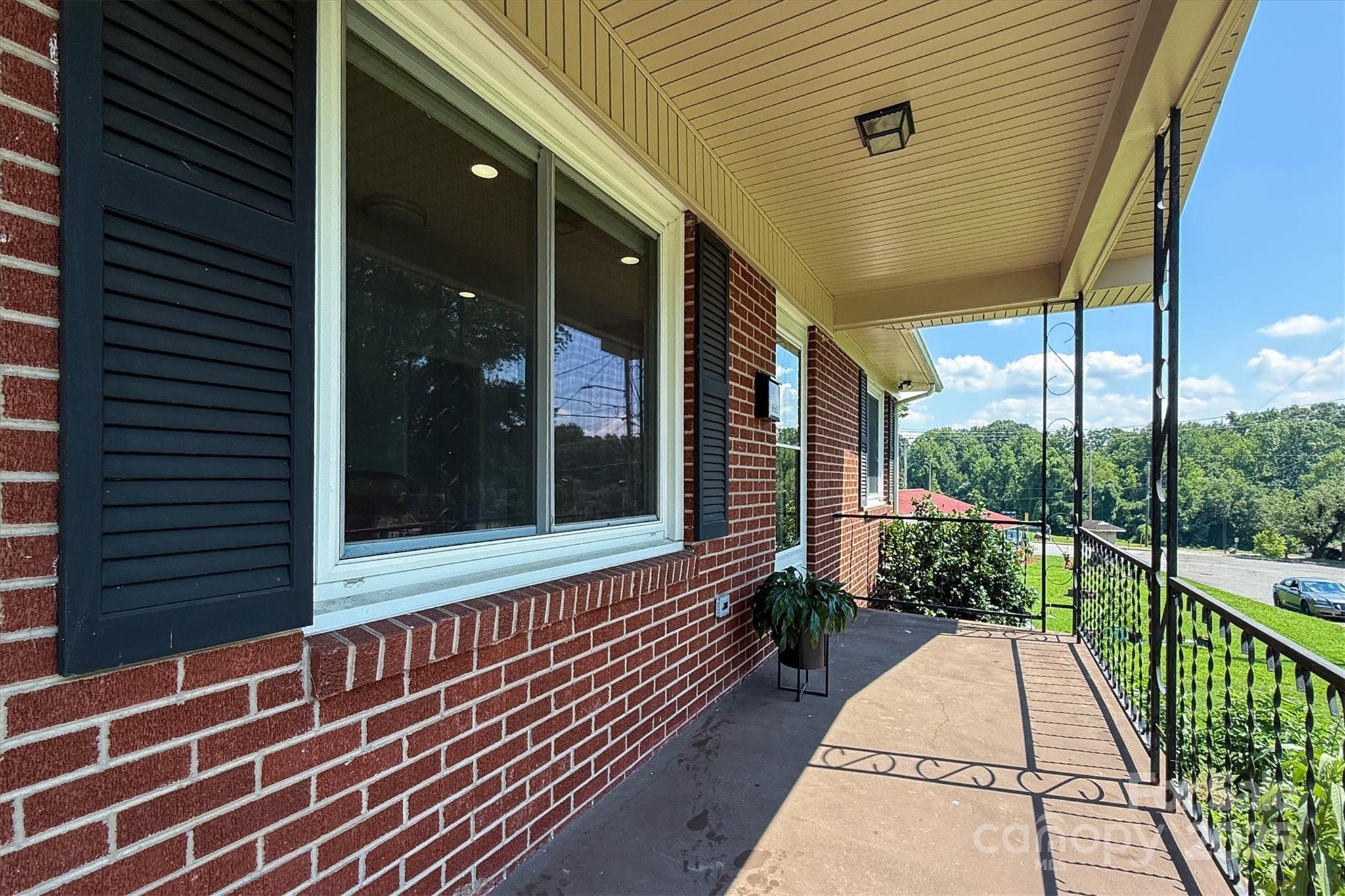 214 Howard Street Morganton, NC 28655 - Photo 5 of 29 a view of a house with a large window