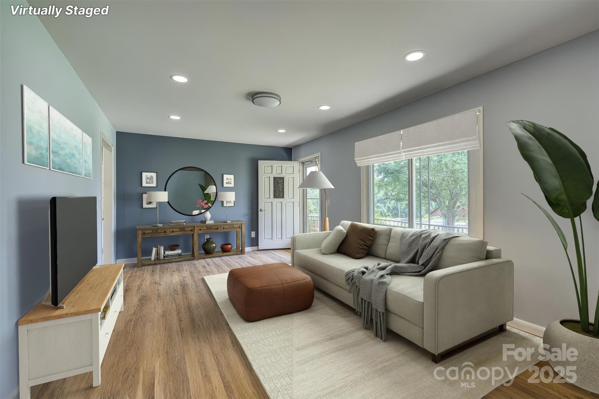 214 Howard Street Morganton, NC 28655 - Photo 8 of 29 a living room with furniture and a large window