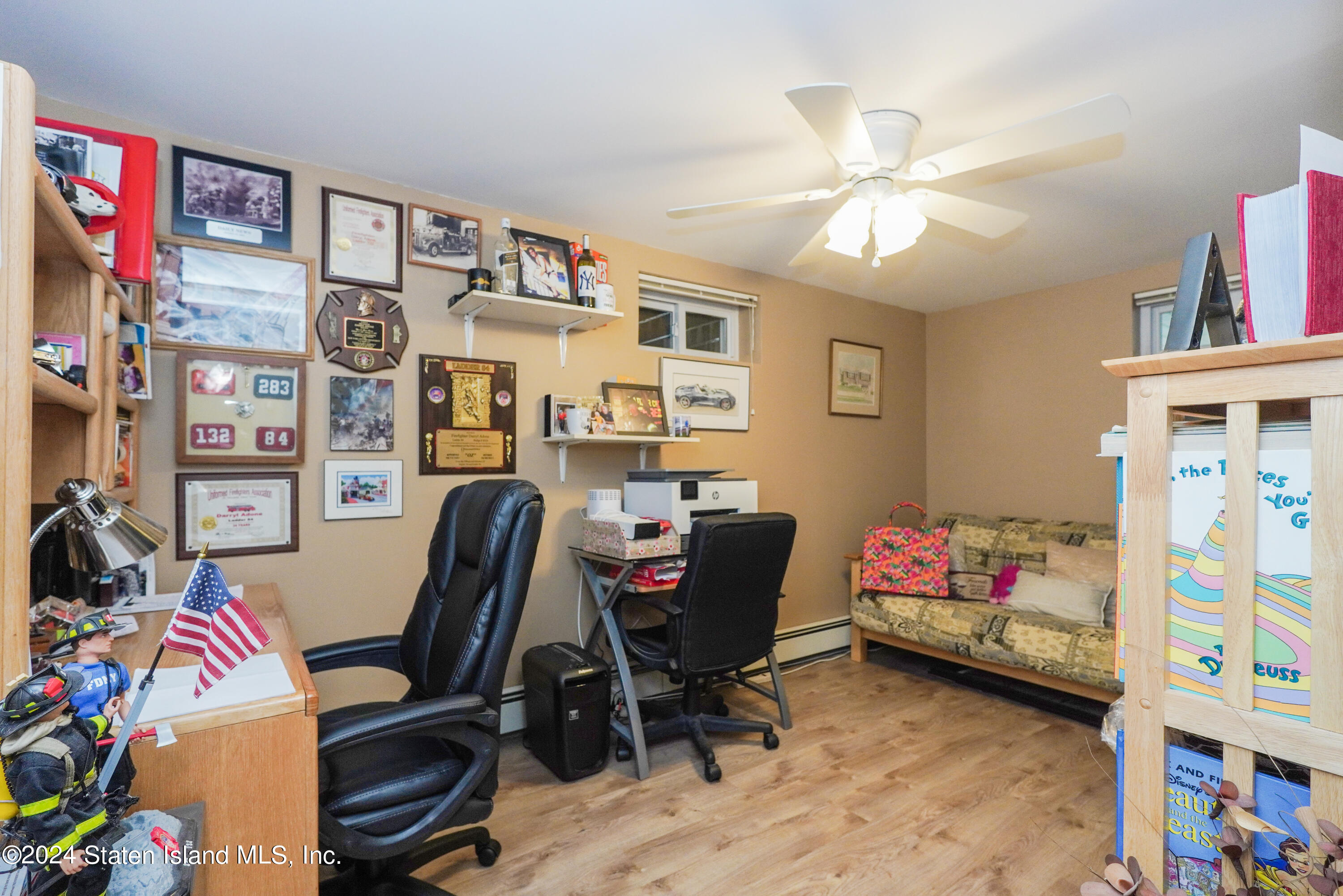 50 Ridgecrest Avenue Staten Island, NY 10312 - Photo 29 of 34 a view of a workspace with furniture and toys