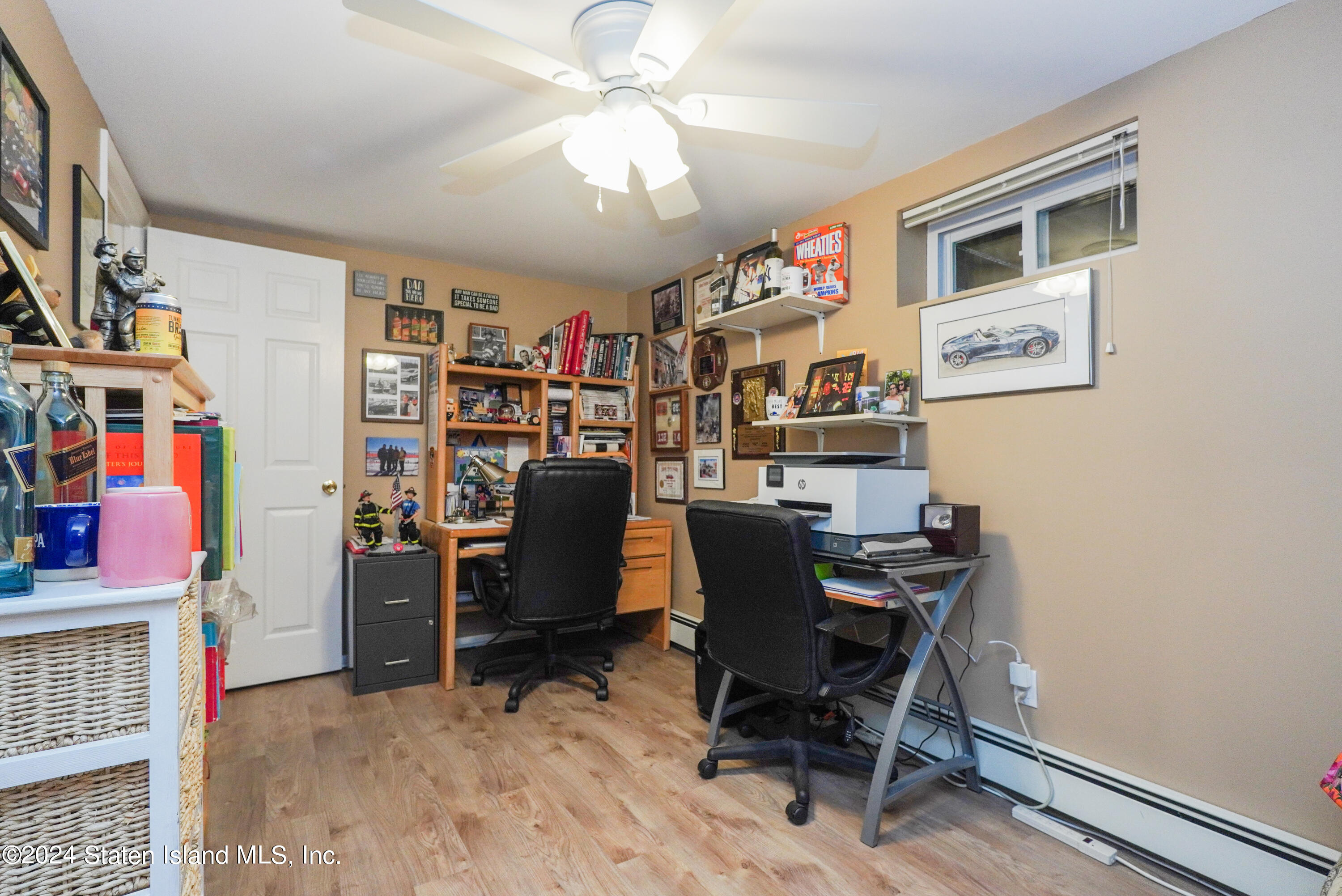 50 Ridgecrest Avenue Staten Island, NY 10312 - Photo 30 of 34 a view of a workspace with furniture and a workspace