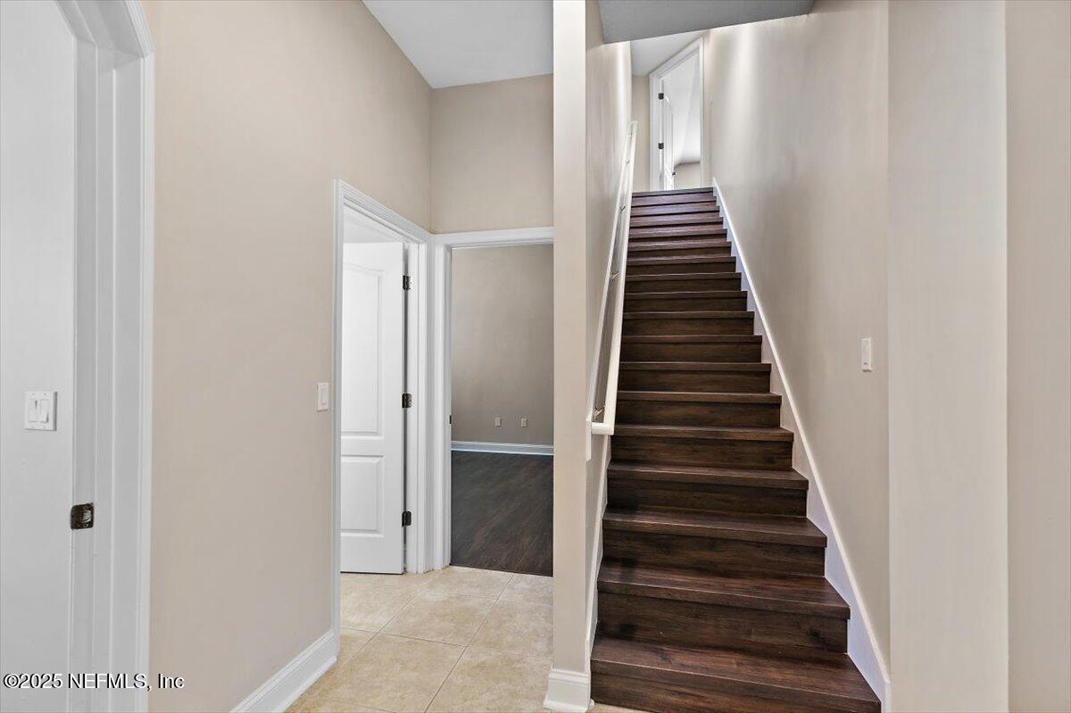 1124 Westfield Way St. Augustine, FL 32095 - Photo 23 of 29 a view of entryway and gallery with wooden floor