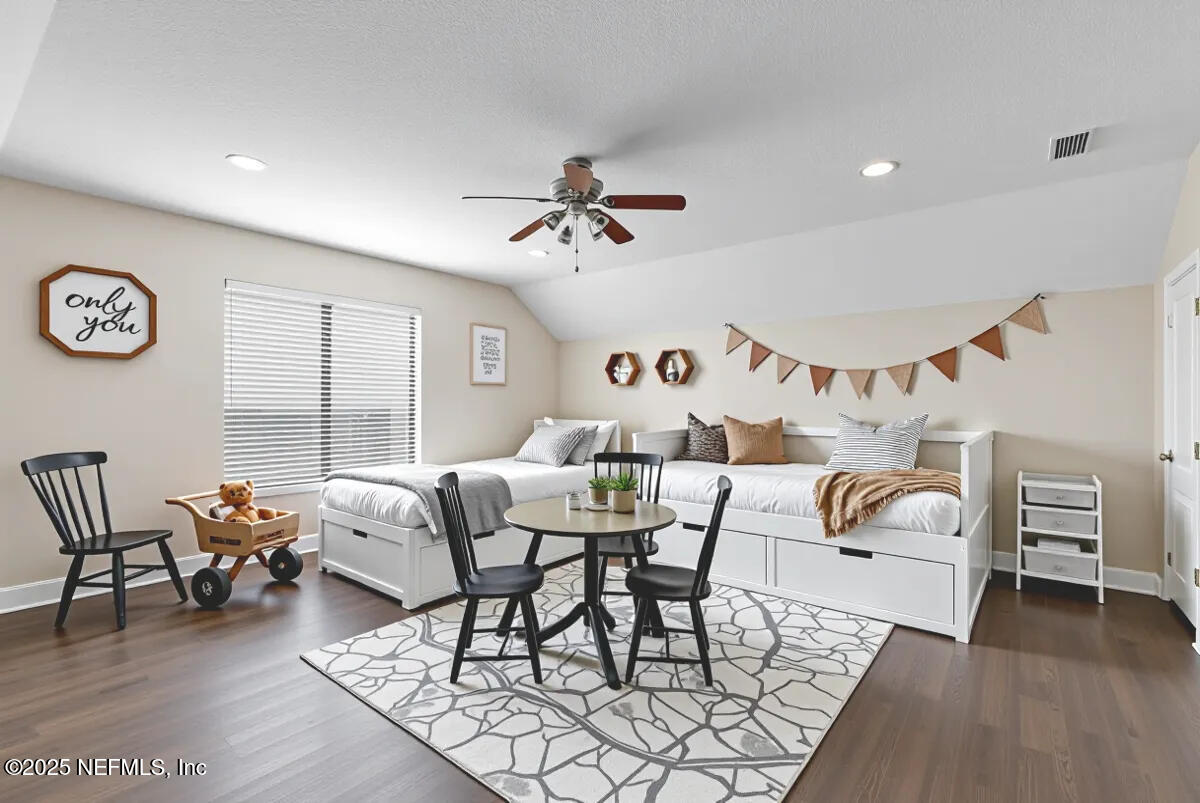 1124 Westfield Way St. Augustine, FL 32095 - Photo 25 of 29 a living room with furniture a rug and a window