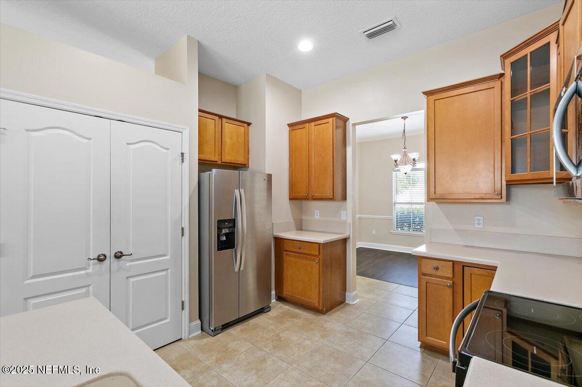 1124 Westfield Way St. Augustine, FL 32095 - Photo 8 of 29 a bathroom with a tub sink and mirror
