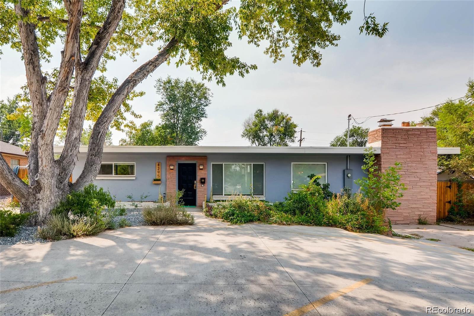 front view of a house with a street