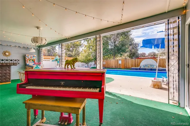 a living room filled with furniture and a rug