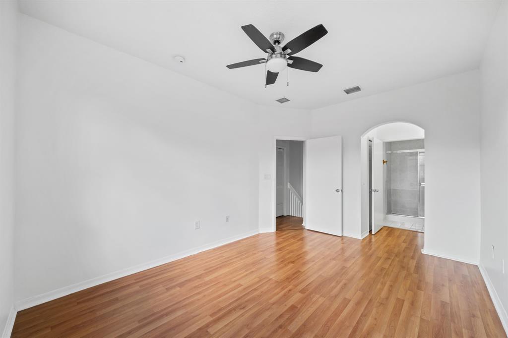 717 Southwest 107th Avenue, Unit 2203 Pembroke Pines, FL 33025 - Photo 13 of 22 a view of a big room with wooden floor and windows