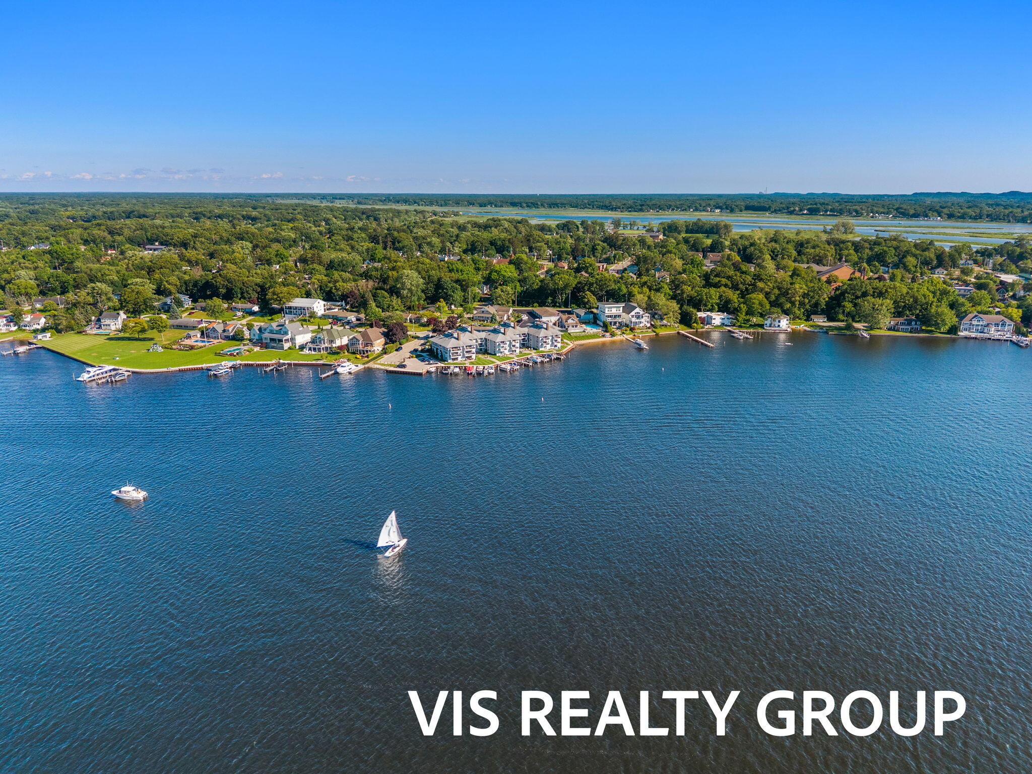 400 Lakeview Court, Unit 8B Spring Lake, MI 49456 - Photo 6 of 64 9-web-or-mls-DJI_20260618181105_0209_D