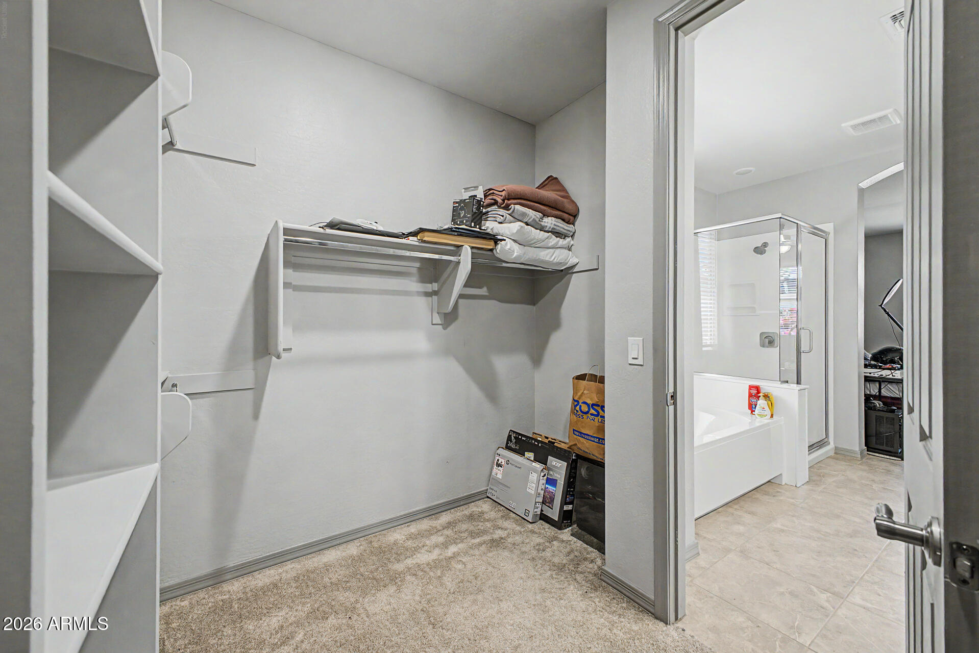 15088 West Garfield Street Goodyear, AZ 85338 - Photo 17 of 31 a view of a walk in closet