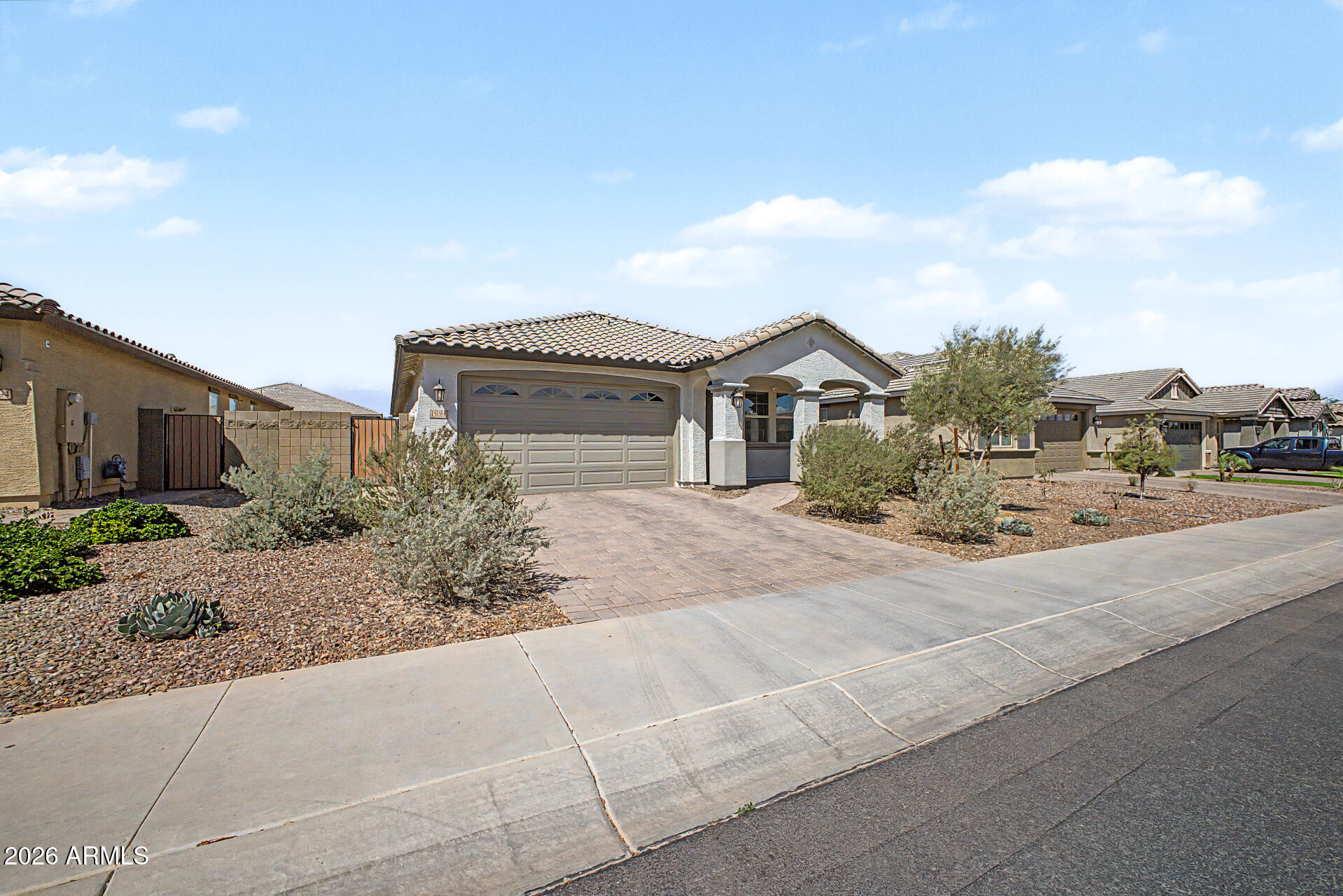 15088 West Garfield Street Goodyear, AZ 85338 - Photo 2 of 31 a house view with a outdoor space