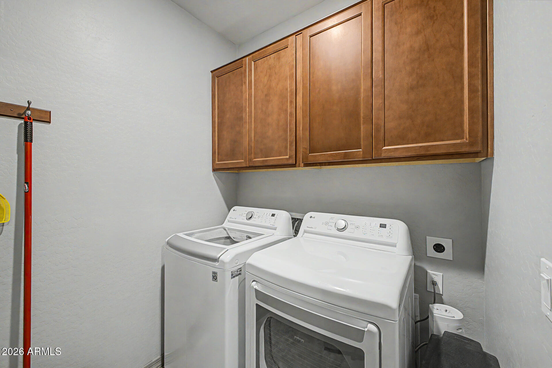 15088 West Garfield Street Goodyear, AZ 85338 - Photo 26 of 31 a utility room with dryer and washer