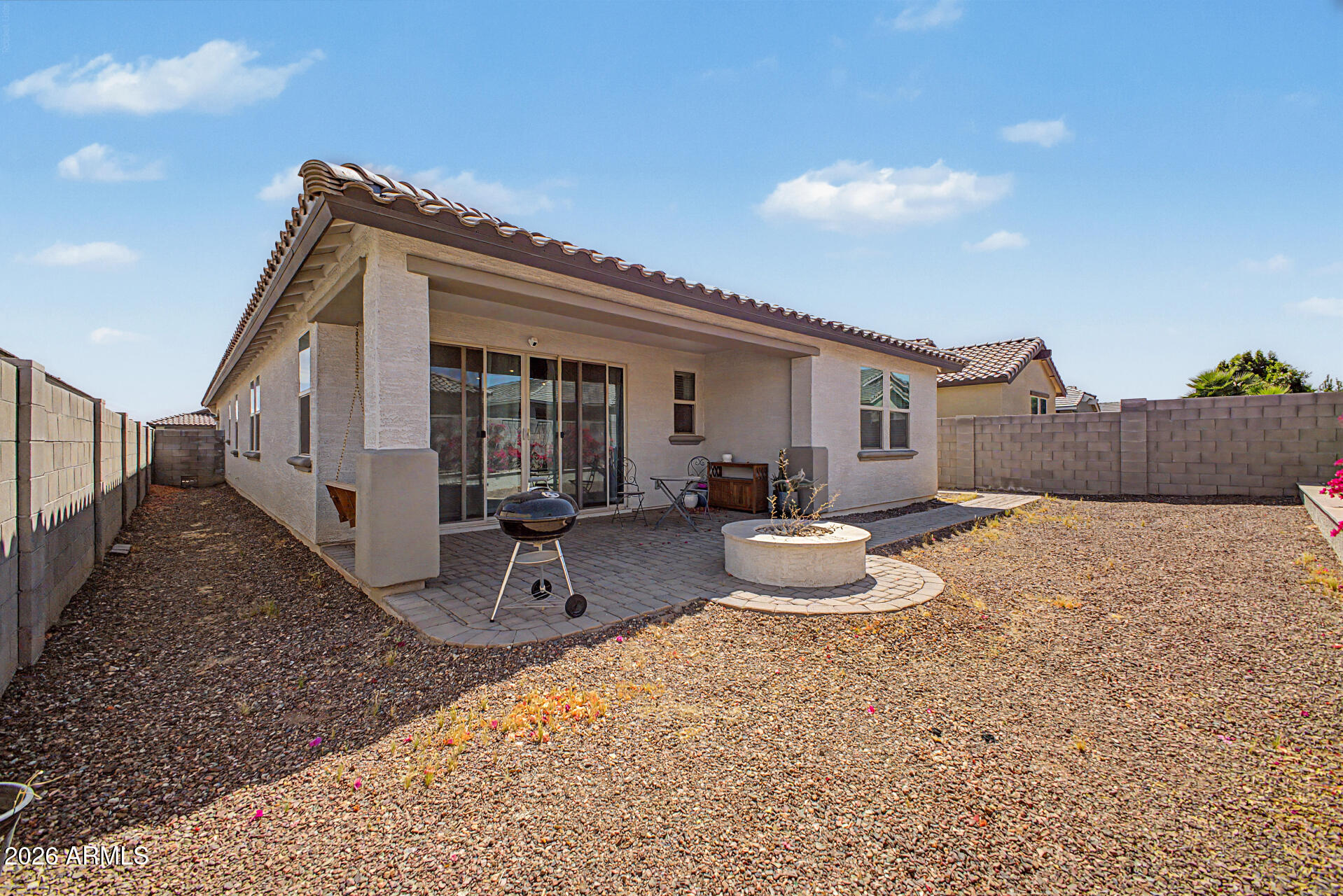 15088 West Garfield Street Goodyear, AZ 85338 - Photo 29 of 31 a view of a house with backyard and sitting area