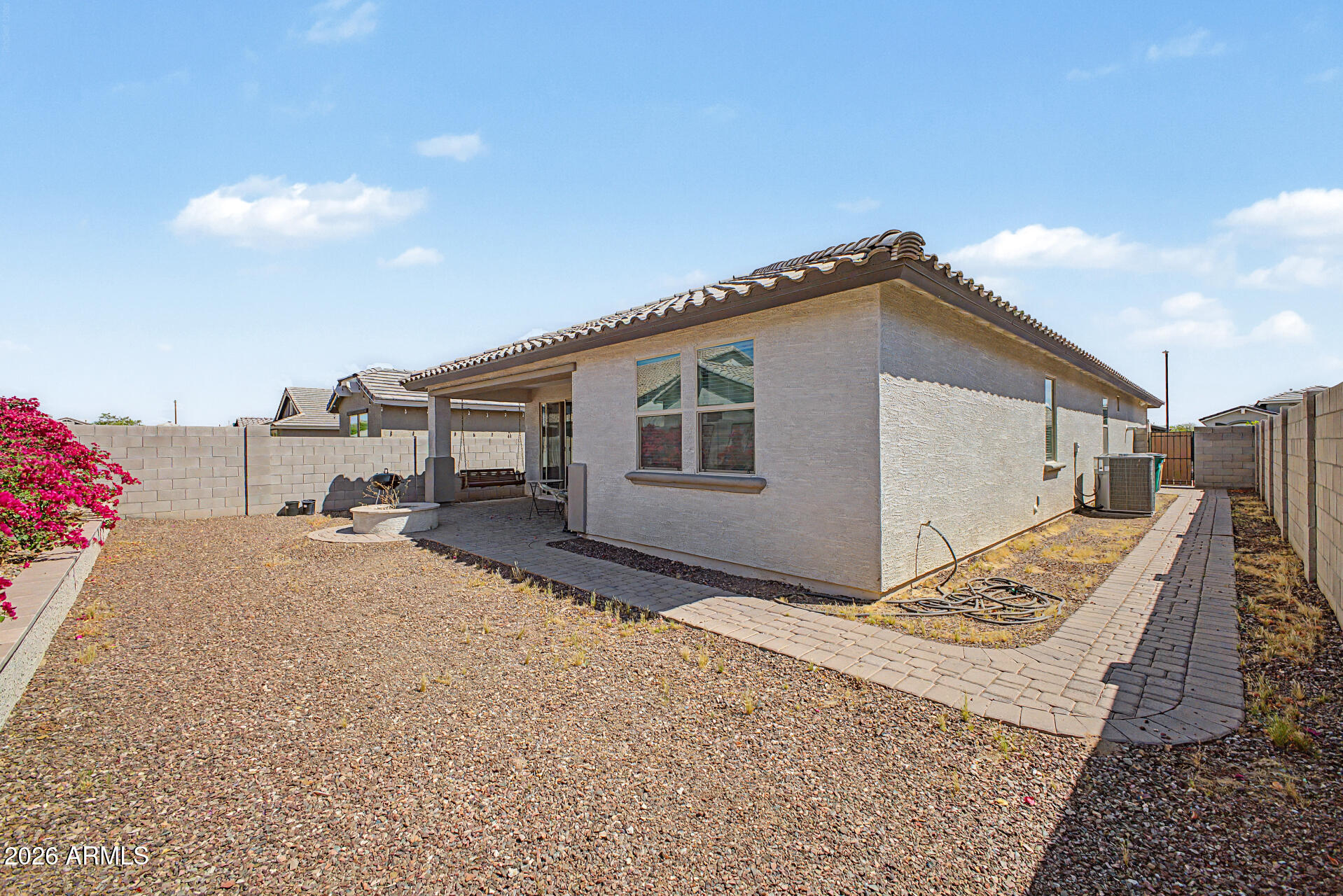 15088 West Garfield Street Goodyear, AZ 85338 - Photo 30 of 31 a backyard of a house