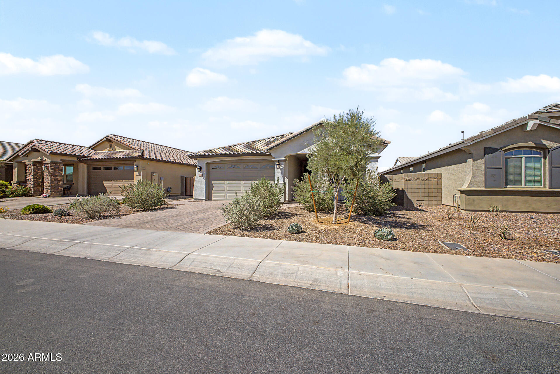15088 West Garfield Street Goodyear, AZ 85338 - Photo 3 of 31 front view of a house with a stove