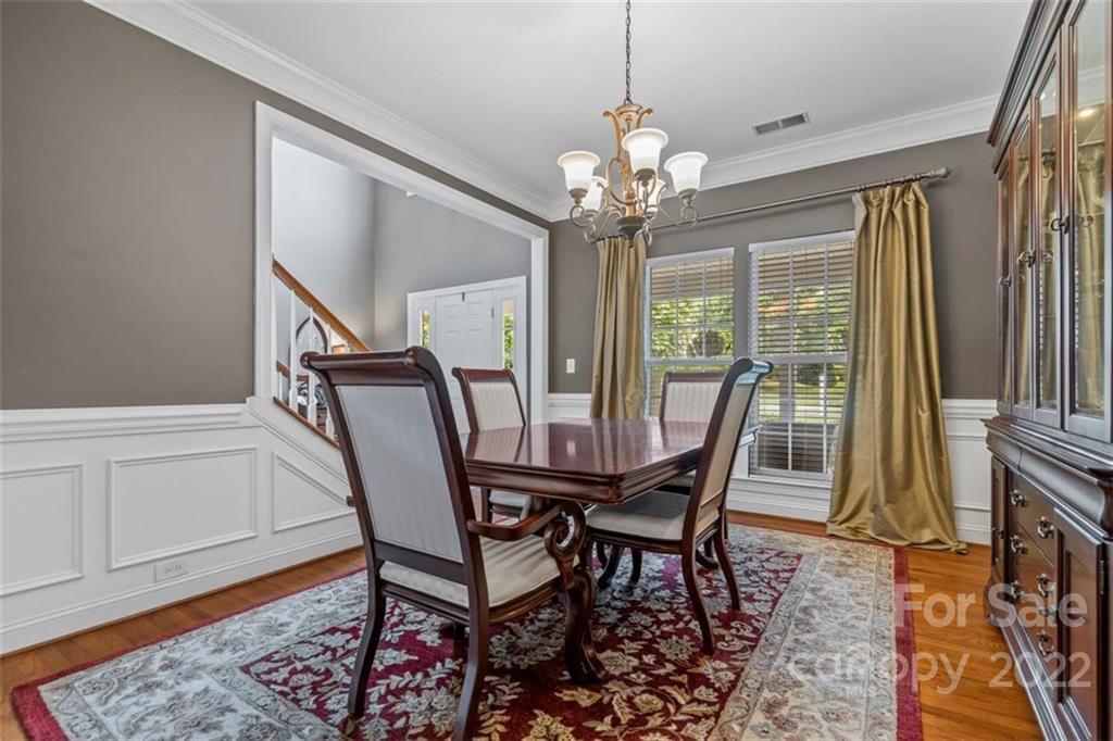 232 Choate Avenue Fort Mill, SC 29708 - Photo 17 of 47 a view of a dining room with furniture window and wooden floor