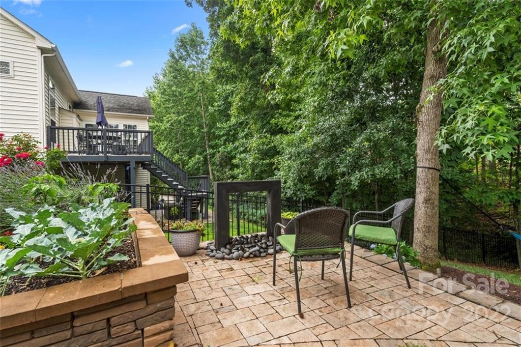 232 Choate Avenue Fort Mill, SC 29708 - Photo 42 of 47 a view of a chairs and table in a backyard
