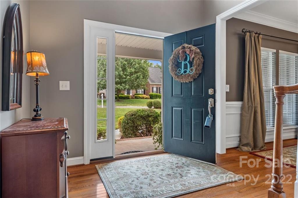 232 Choate Avenue Fort Mill, SC 29708 - Photo 5 of 47 a very nice looking empty room with a large window and mirror
