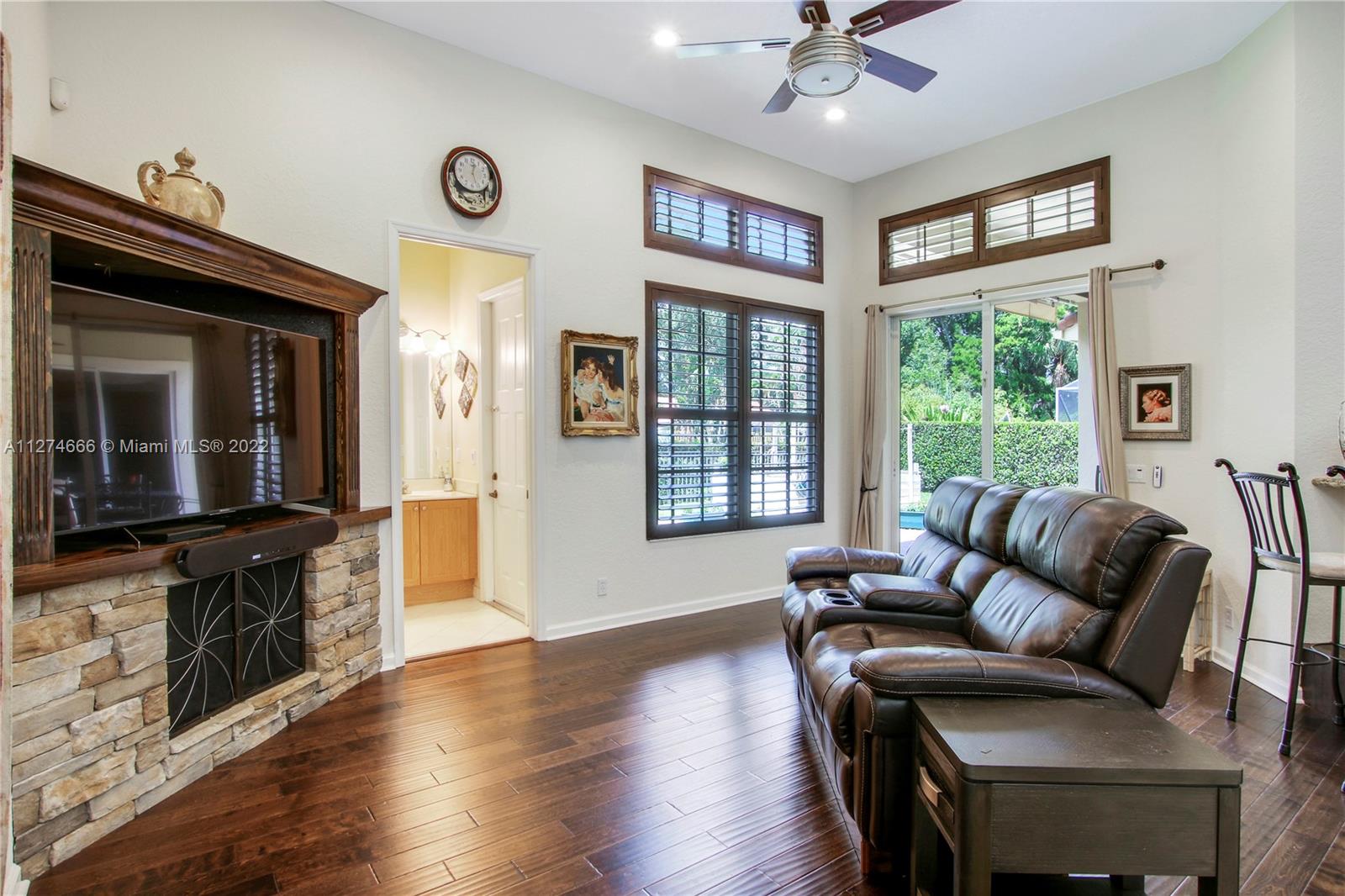 116 Via Rosina Jupiter, FL 33458 - Photo 12 of 32 a living room with furniture tv and a window