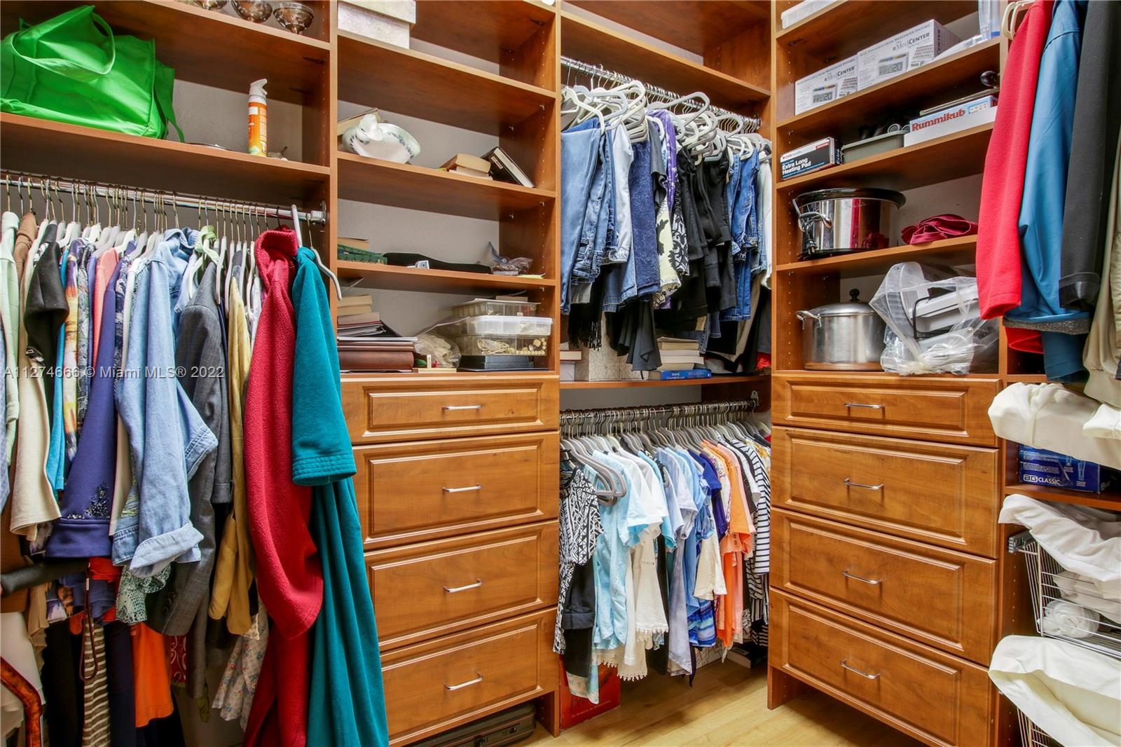 116 Via Rosina Jupiter, FL 33458 - Photo 17 of 32 a view of walk in closet with clothes and shoes