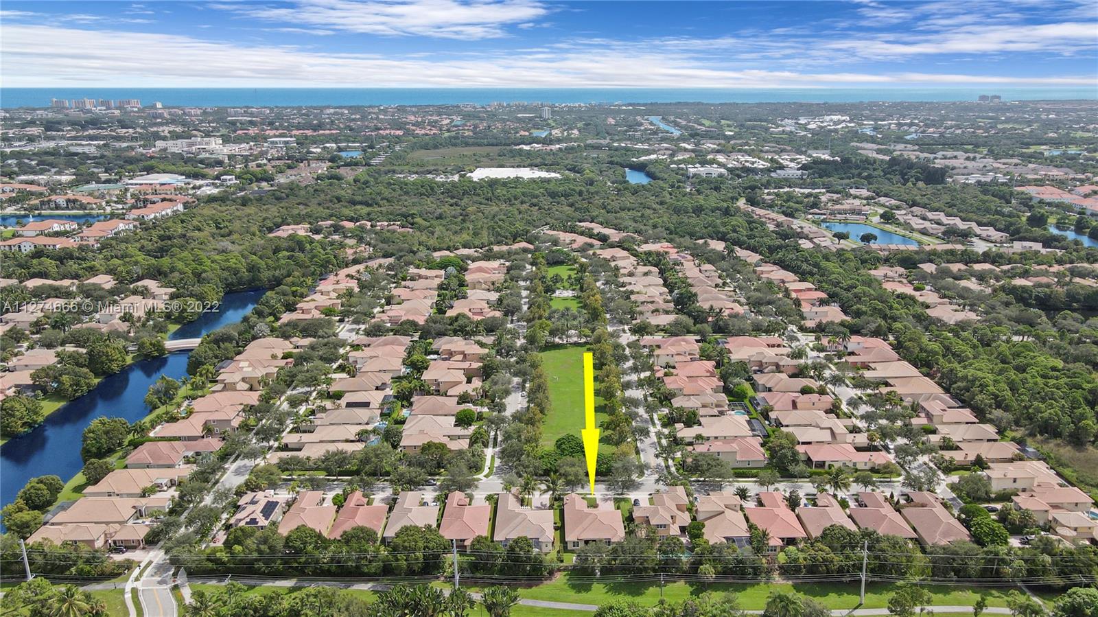 116 Via Rosina Jupiter, FL 33458 - Photo 5 of 32 an aerial view of residential building with parking space