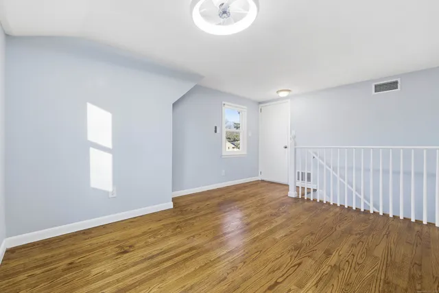 a view of an empty room and window