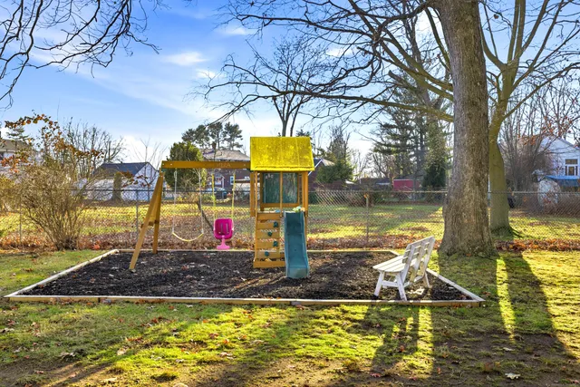 a view of a water fountain in front of the house