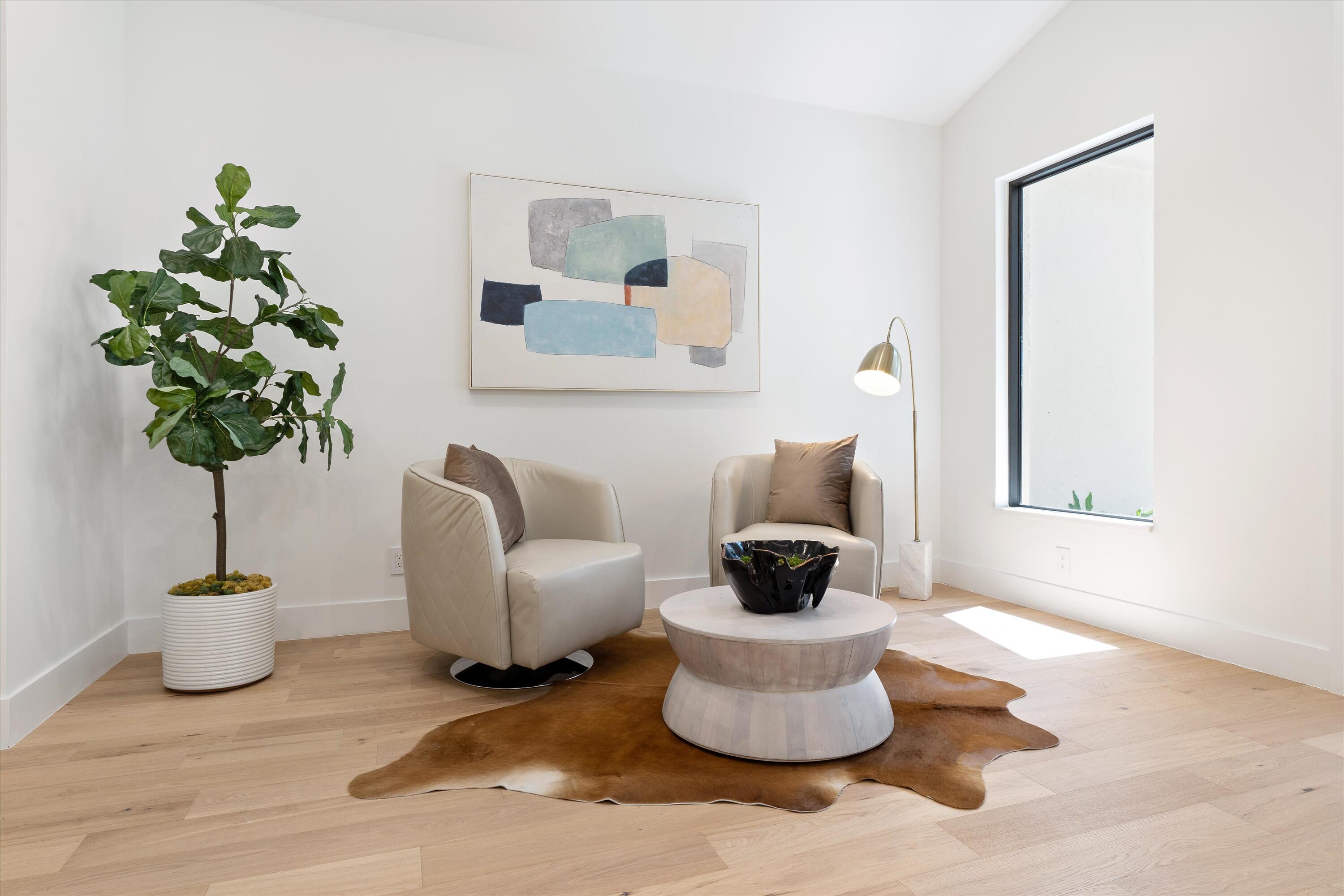 2299 Northwest 30th Road Boca Raton, FL 33431 - Photo 6 of 50 a living room with furniture and a potted plant