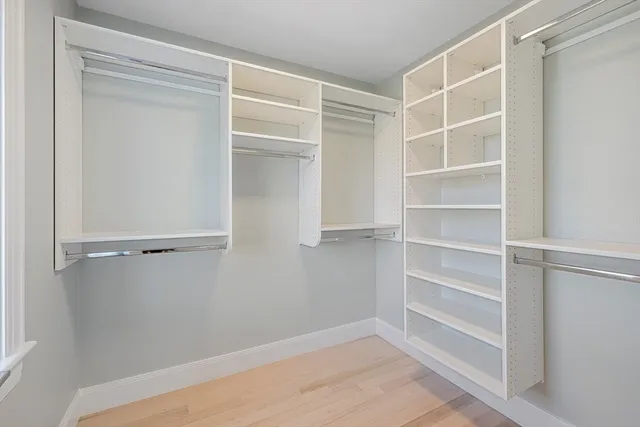 a view of an empty walk in closet