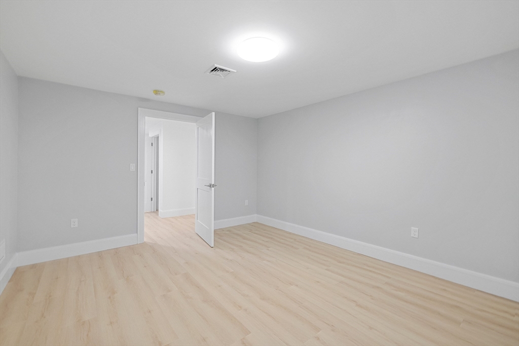 4 Aerial Street Lexington, MA 02421 - Photo 27 of 35 a view of an empty room