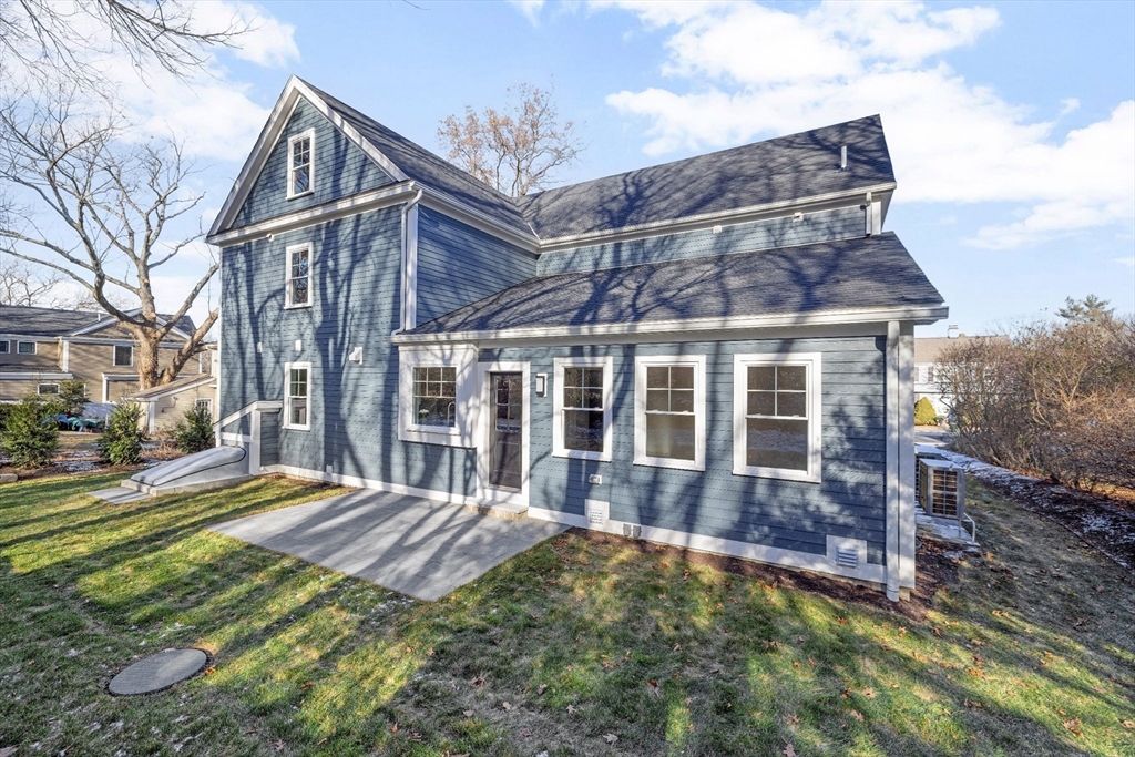 4 Aerial Street Lexington, MA 02421 - Photo 32 of 35 a view of a house with a yard and balcony