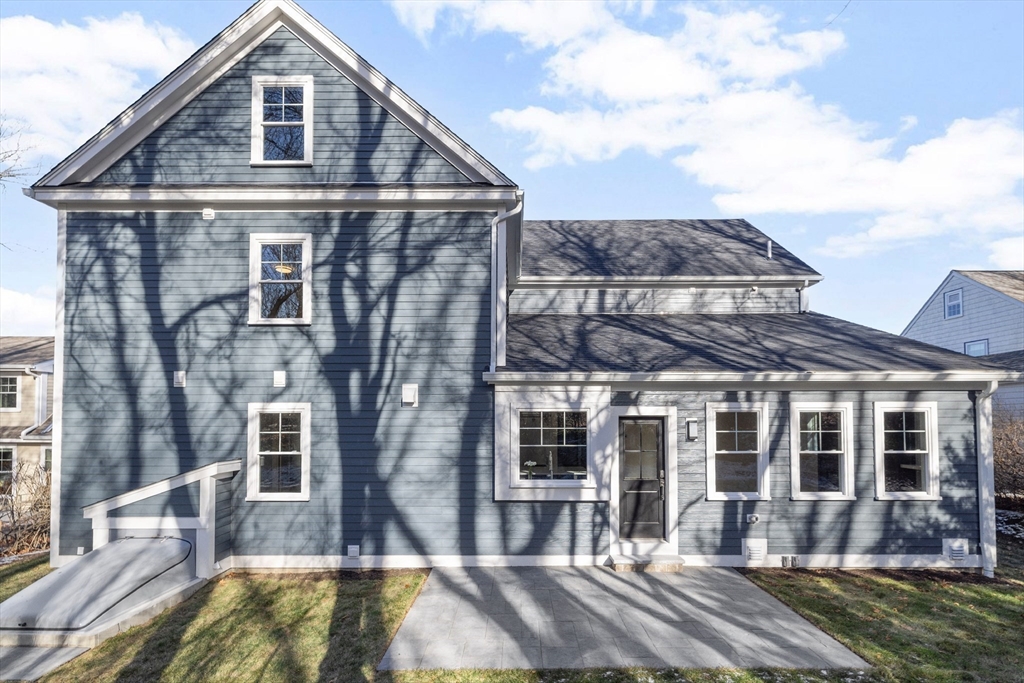 4 Aerial Street Lexington, MA 02421 - Photo 33 of 35 a front view of a house with a yard balcony
