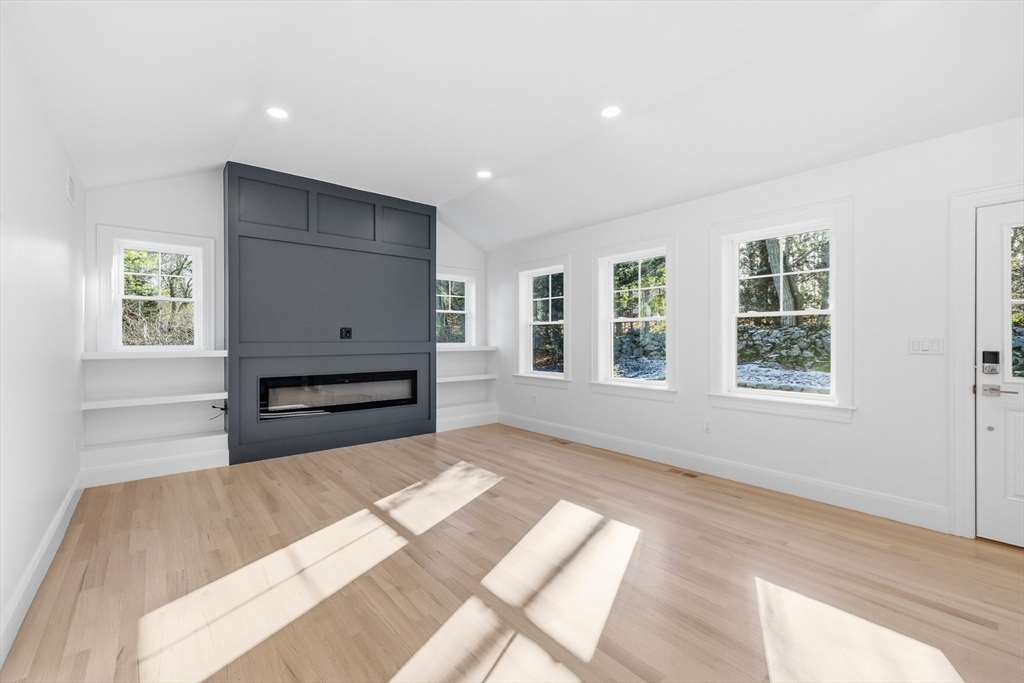 4 Aerial Street Lexington, MA 02421 - Photo 8 of 35 a view of a bedroom with furniture and windows