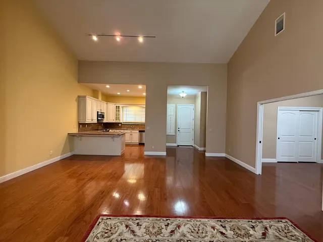 a lobby with furniture and rug