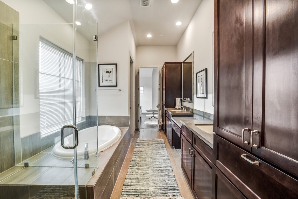 15943 Morgan Street Sugar Land, TX 77478 - Photo 25 of 41 a large bathroom with a tub and shower
